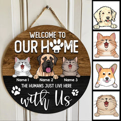 Round Wooden Door Sign, Personalized Gift For Dog & Cat Lovers, Welcome To Our Home, The Humans Just Live Here With Us